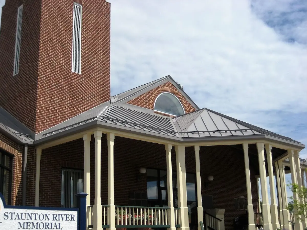 Skilled roofing craftsmen working on a residential roof in Taylors
